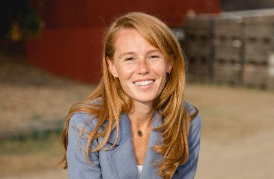 Congressional candidate Rebecca Cooke is pictured on her farm.