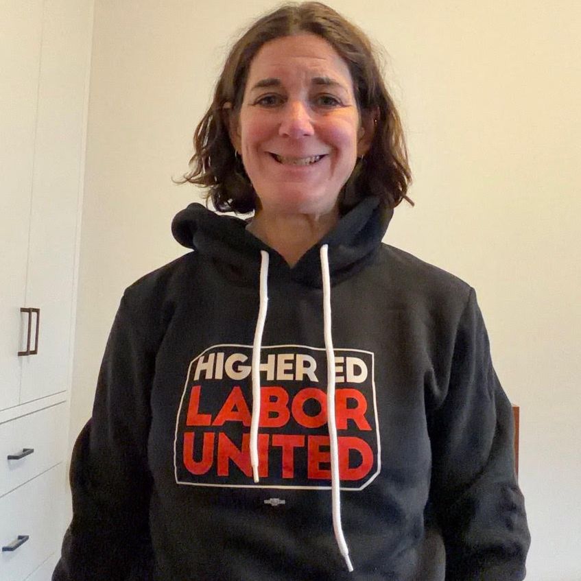 Becky Givan, HELU Steering Committee member, wearing a first edition HELU sweatshirt