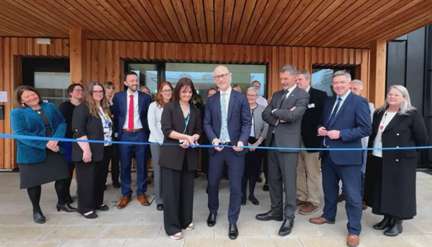 Team of people in a welcoming office and foodbank space.