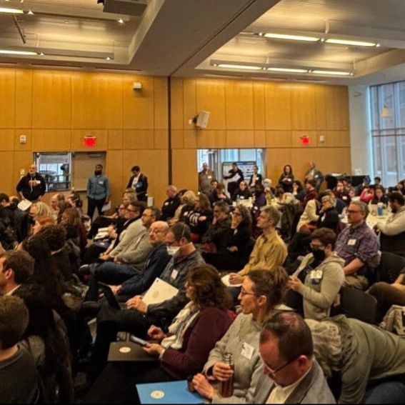 Minnesota higher ed workers march with HELU banner